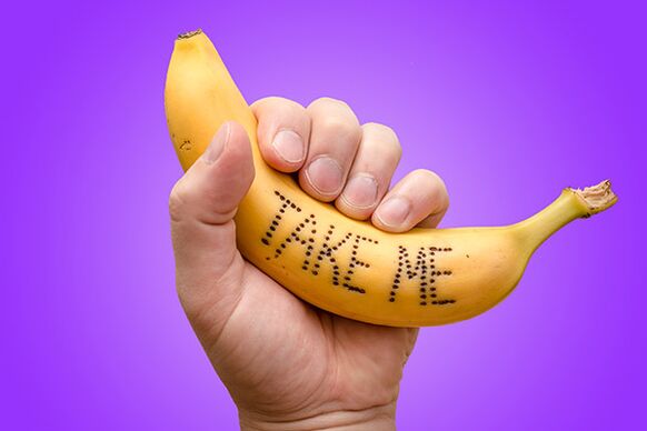 the banana in his hand symbolizes a penis with an enlarged head